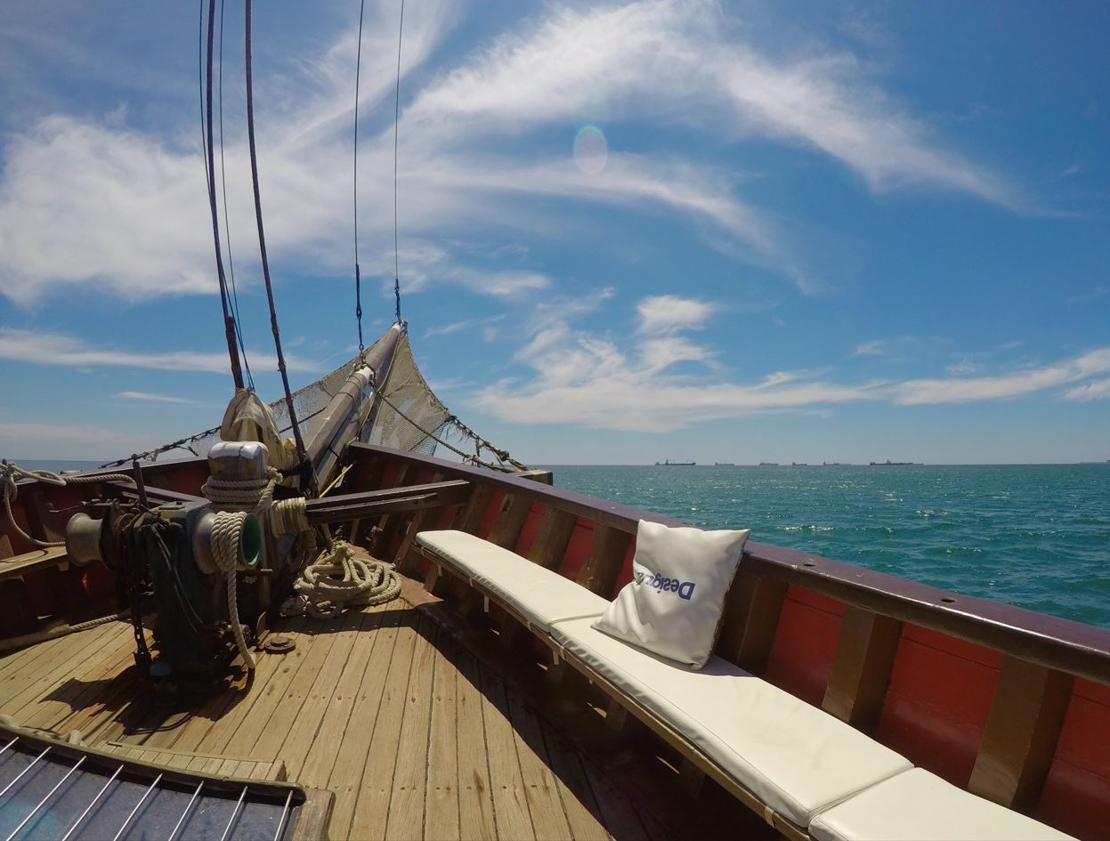 the view from a boat while sailing, a popular Barcelona adventure activity