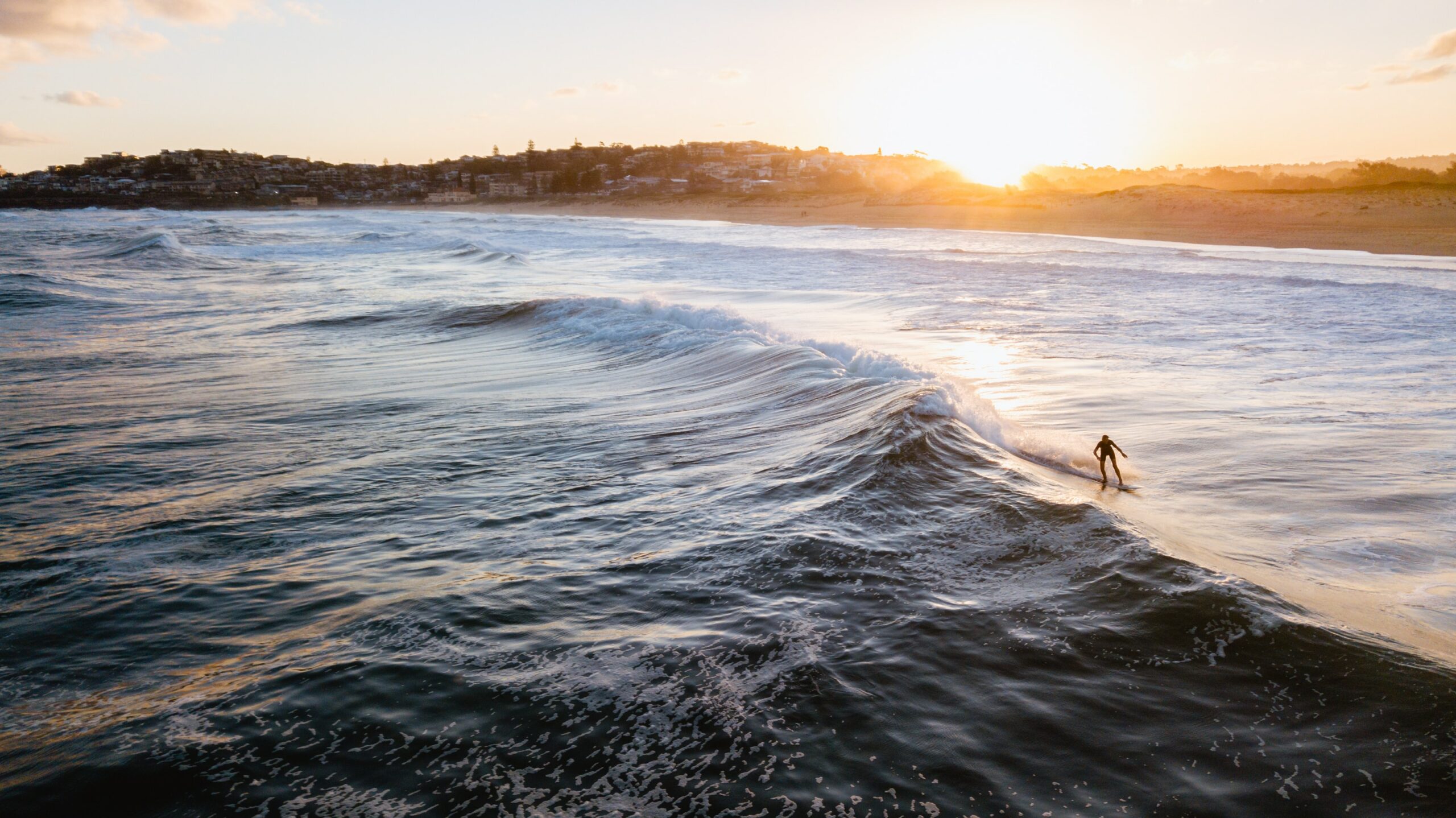 A person surfing during daytime in Australia